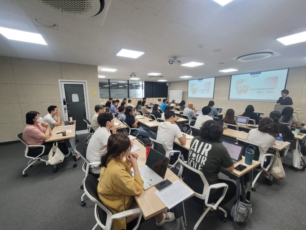 Students in a phone-free classroom focusing on a lesson while smartphones stay put away